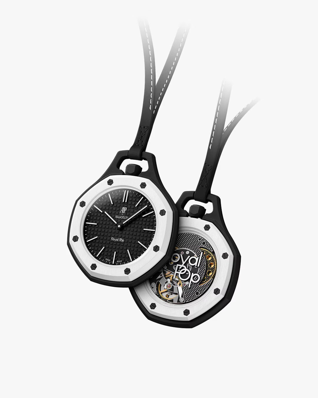 Two pendant watches with black and white faces suspended by ribbons, one showing the dial and one displaying the exposed mechanism